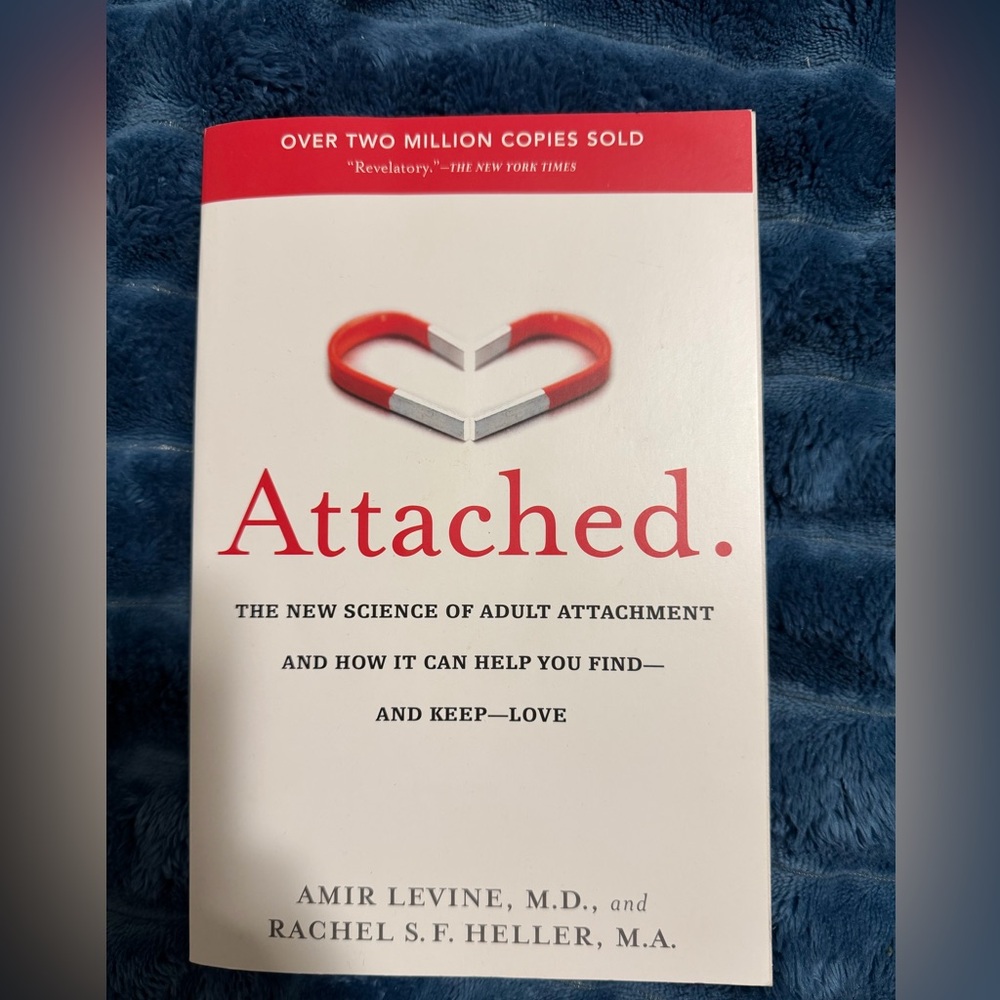 Attached. Paperback Book by Amir Levine